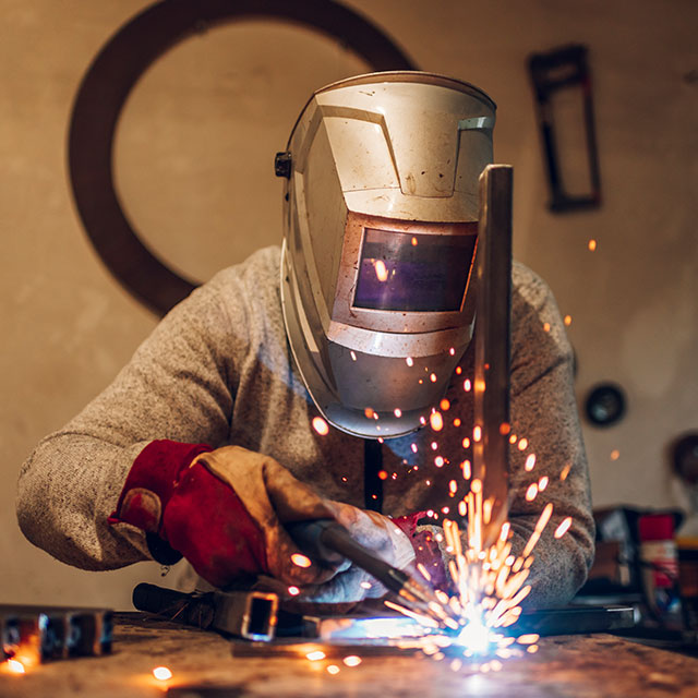 man-welding-with-mask-on