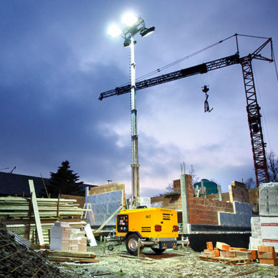 nighttime-construction-site-with-light-tower